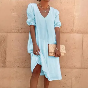 Elegant light blue cotton linen V-neck casual midi dress featuring comfortable loose fit style