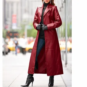 Long wine red faux leather trench coat with buttons for women in an urban street style