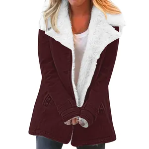 Detail of women's warm winter coat with white fleece lining and burgundy shell