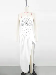 Full view of elegant white strapless evening gown with rhinestone bodice on mannequin