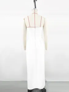 Detailed back view of an elegant white strapless bandage evening gown on mannequin