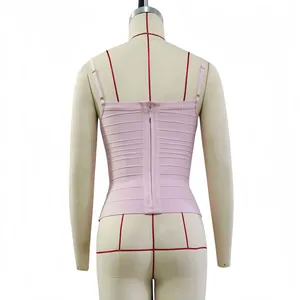 Back view of pink bandage camisole showing zipper closure and textured stripes
