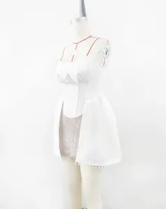 Detailed side view of white lace bandage dress featuring elegant pearl trim on mannequin