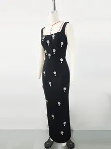 Elegant black sleeveless square neck bandage dress featuring sparkling rhinestone flowers