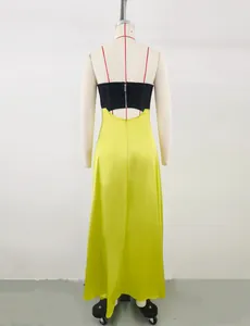 Back view of a chic color-block French style maxi dress in black and lime green