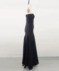 Side view of black French mesh patchwork bandage evening gown on mannequin