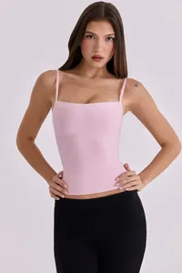 Front view of a light pink square neck bandage camisole with ribbed texture detail
