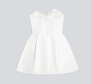 Back view of white strapless bandage mini dress with 3D flower detail for parties