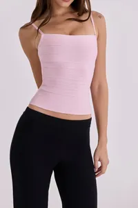 Detailed view of a light pink bandage camisole with textured horizontal stripes and square neck