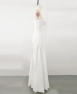 Side view of white French mesh patchwork bandage banquet gown showing silhouette and fabric.