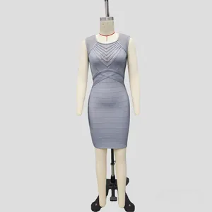 Front view of a grey-blue bandage dress with mesh V-neckline details on a mannequin.