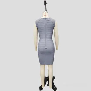 Rear view of elegant grey-blue bandage bodycon dress featuring mesh shoulder panels