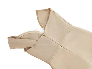 Close-up detail showing the hidden back zipper and strap design of a nude bandage dress