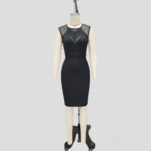 Detailed view of black bandage bodycon dress with elegant mesh paneling and tight fit.