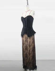 Exquisite close-up view of elegant black beaded corset gown with intricate floral lace