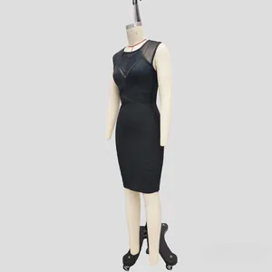 Detailed view of black bandage dress featuring mesh stitching and diamond lattice design