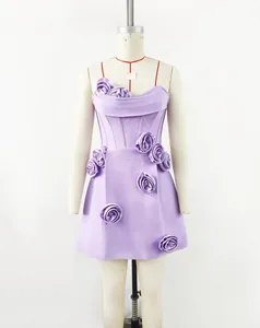 Detail view of the lavender corset mini dress with 3D floral appliqués and structured fit.