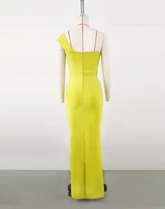 Back view of elegant lime yellow one-shoulder bandage maxi dress on a mannequin