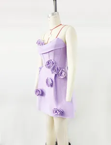 Detailed side view of lavender strapless bandage dress with large 3D fabric flower accents