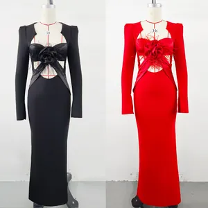 Detailed view of elegant black and red evening bandage dresses with feather rose accents