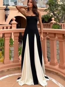 Elegant black and white paneled strapless floor-length bandage dress for formal banquets.