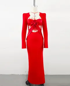 Elegant red evening gown with 3D flower, feather details and waist cutouts