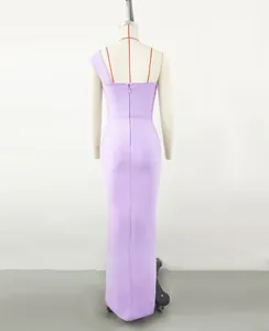Detailed back view of an elegant lavender one-shoulder bandage evening gown on a mannequin