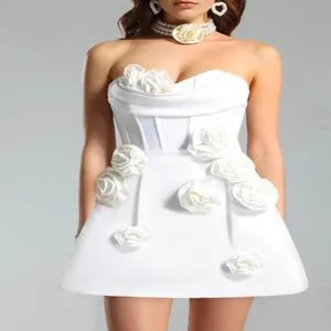 Elegant white strapless mini dress with 3D floral accents perfect for wedding parties