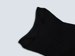 Close-up of back invisible zipper on a chic black bandage party dress