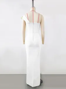 Detailed back view of an elegant white one-shoulder bandage evening dress on a mannequin