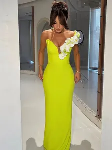 Elegant neon yellow one-shoulder bandage evening dress with floral shoulder detail