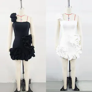 Detailed side-by-side view of black and white ruffled puff mini dresses for party wear