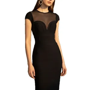 Elegante vestido negro estilo Hepburn con retazos de malla y diseño de cintura alta