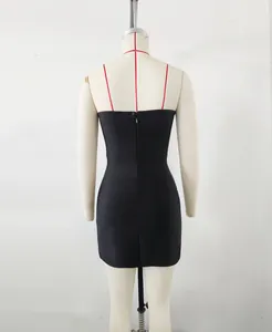 Back view detail of a high-end black bandage mini dress with zipper for evening parties