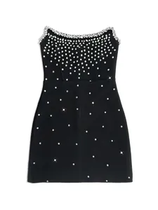 Detailed view of a black bandage mini dress featuring sparkling rhinestone details