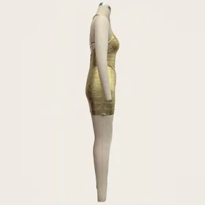 Side view of a sexy gold metallic bandage mini dress on a mannequin for party evening