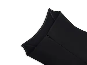 Close-up detail of the back hidden zipper on a premium black bandage party dress