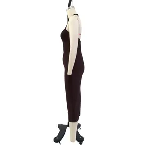 Side view of a wine red halter neck bandage dress on a mannequin showing bodycon fit