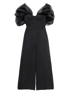 Elegant black off-shoulder jumpsuit with sheer organza puff sleeves.