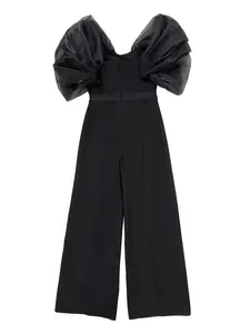 Elegant black off-the-shoulder jumpsuit featuring dramatic puffy organza sleeves for summer