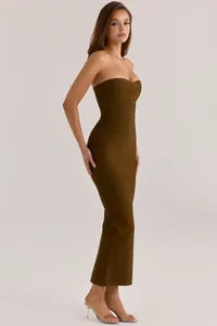 Close-up detail of olive green shimmering bandage dress with elegant sweetheart neckline