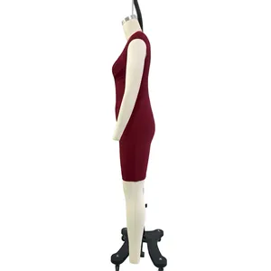 Side view detail of a sleeveless knitted burgundy bodycon evening dress.
