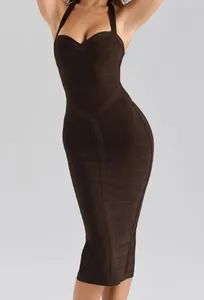 Detail view of the halter neck and sweetheart bodice on this brown bandage dress