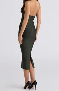 Back view of a dark green halter neck bandage midi dress with zipper detail