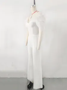 Elegant white off-the-shoulder bandage jumpsuit with sheer organza puff sleeves.