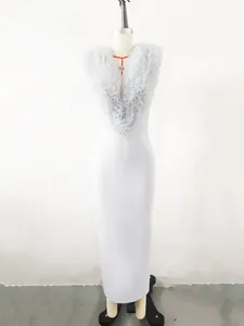 Front detail view of an elegant grey bandage dress featuring a ruffled tulle neckline