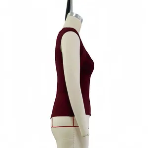 Side view detail of a wine red sleeveless bandage vest shown on a professional dress form