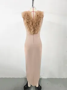 Back view detail of elegant pink bandage dress with ruffled tulle flower accents