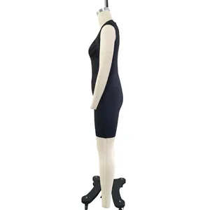 Sleeveless black bandage evening dress side view detail on professional white mannequin