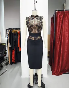 Detailed view of elegant black lace bodycon bandage dress on mannequin